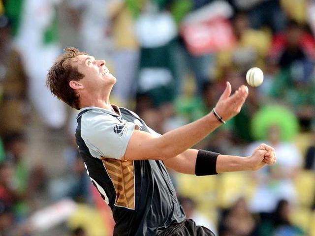 New Zealand bowler Tim Southee celebrates after taking a catch to dismiss Pakistan cricketer Imran Nazir during the ICC Twenty20 Cricket World Cup match between Pakistan and New Zealand at the Pallekele International Cricket Stadium in Pallekele . AFP Photo/ Prakash Singh