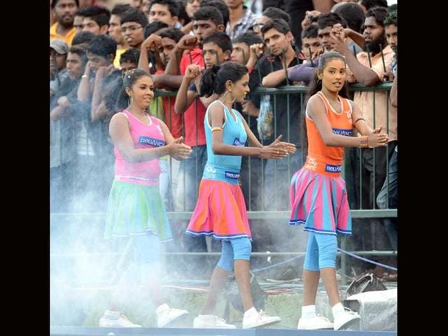 Cheerleaders celebrate a wicket during the ICC Twenty20 Cricket World Cup match between Pakistan and New Zealand at the Pallekele International Cricket Stadium in Pallekele . AFP Photo/ Prakash Singh