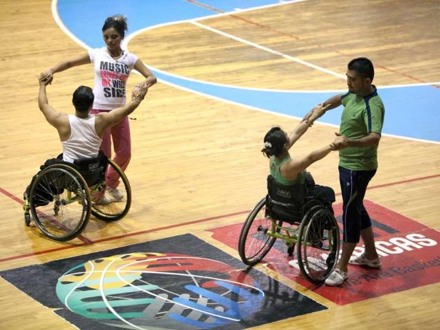Combined dancers train before the First Regional Dance Competition on Wheelchair Sports in Cancun. Reuters/Victor Ruiz Garcia 