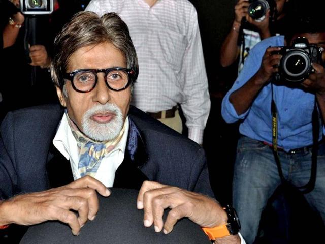 Amitabh Bachchan gestures during the launch of the website.