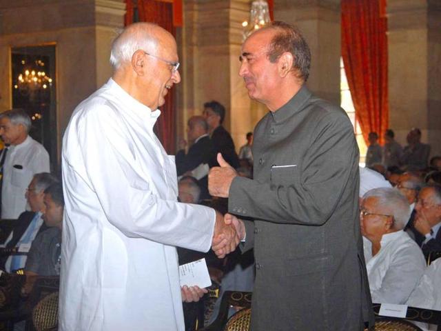 National Conference leader Farooq Abdullah and Union health minister Ghulam Nabi Azad are seen at the swearing in ceremony of new Chief Justice of India Altamas Kabir at Rashtrapati Bhavan in New Delhi. UNI