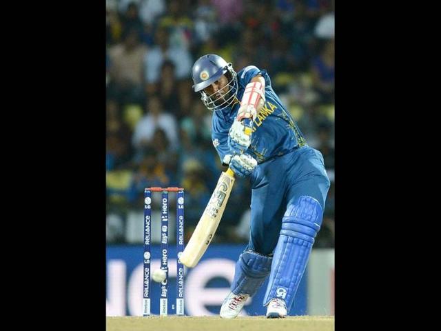 Sri Lankan cricketer Tillakaratne Dilshan plays a shot during the ICC Twenty20 Cricket World Cup's Super Eight match between Sri Lanka and West Indies at The Pallekele International Cricket Stadium in Pallekele. AFP Photo/Prakash Singh