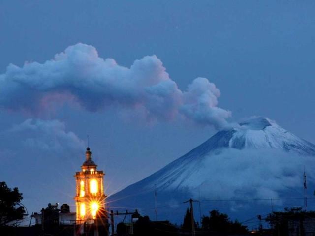 Ash and smoke spew from Popocatepetl volcano in Panotla community on Tlaxcala, Mexico. AFP Photo