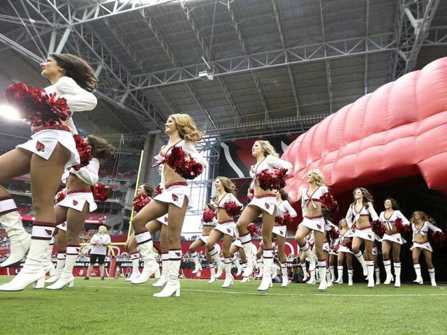 Arizona Cardinals cheerleaders make their way out onto the field before the start of their NFL football game against the Miami Dolphins in Phoenix, Arizona. Reuters Photo