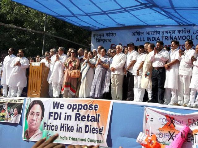 Trinamool Congress chief and West Bengal chief minister Mamata Banerjee with the party leaders at a party rally against FDI in multi-brand retail and diesel price hike in New Delhi. (PTI Photo by Atul Yadav)