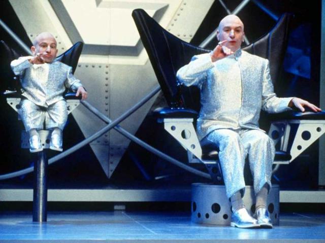 In this undated publicity file photo provided by New Line Cinema, Mike Myers, right, and Verne J. Troyer perform in a scene from New Line Cinema's comedy Austin Powers: The Spy Who Shagged Me. The movie, a James Bond spoof, stars Mike Myers as the sexually charged man of mystery. The Austin Powers movies have done the best Bond parodies. (AP Photo/New Line Cinema, K. Wright, HO, File)