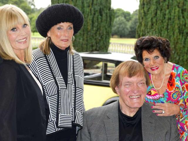 Actors, from left, Britt Ekland, Tania Mallet, Richard Kiel and Eunice Gayson pose at a photocall for Bond 50 on Friday, Sept. 21, 2012 in London. (Photo by Jonathan Short/Invision/AP)