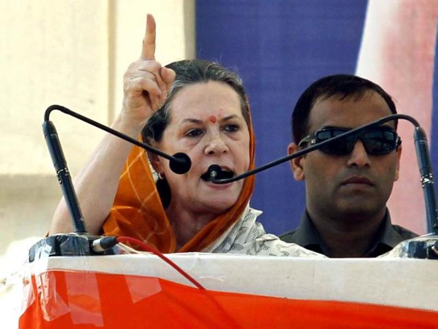 Congress president Sonia Gandhi addresses a campaign rally ahead of the Gujarat state elections in Rajkot. AP photo