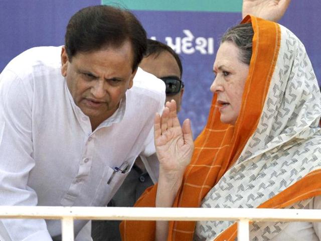 A file photo of Ahmed Patel with Congress president Sonia Gandhi at an election campaign rally in Rajkot. (PTI photo)