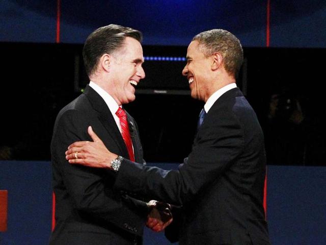 Republican presidential nominee Mitt Romney shakes hands with President Barack Obama at the start of the first 2012 US presidential debate in Denver. Reuters/UNI