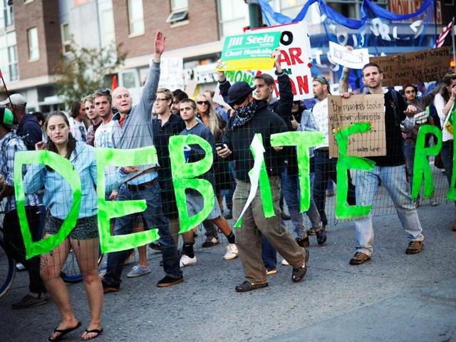 Occupy Denver protesters rally against the presidential debate, which was being held at the University of Denver. AP/The Denver Post