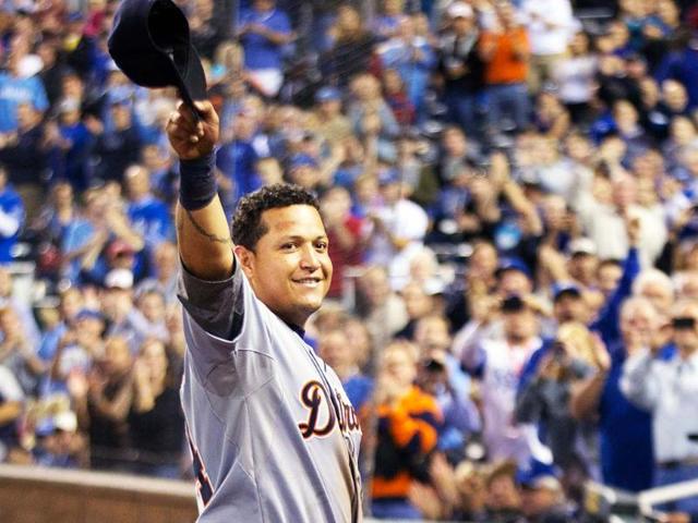 Detroit Tigers' Miguel Cabrera waves to the crowd after being replaced during the fourth inning of a baseball game against the Kansas City Royals at Kauffman Stadium in Kansas City, Missouri. AP/Orlin Wagner