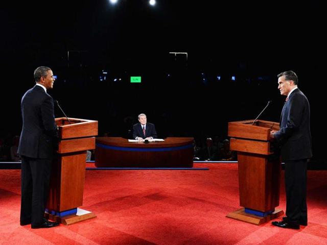 US President Barack Obama and Republican challenger Mitt Romney participate in their first debate at the University of Denver in Denver, Colorado. (AFP Photo)