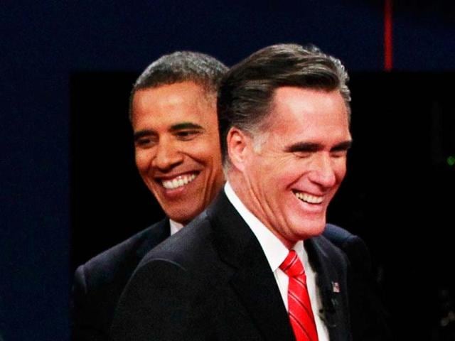 US President Barack Obama (R) greets Republican presidential candidate Mitt Romney (L) following the first presidential debate at Magness Arena at the University of Denver in Denver, Colorado. (AFP Photo)