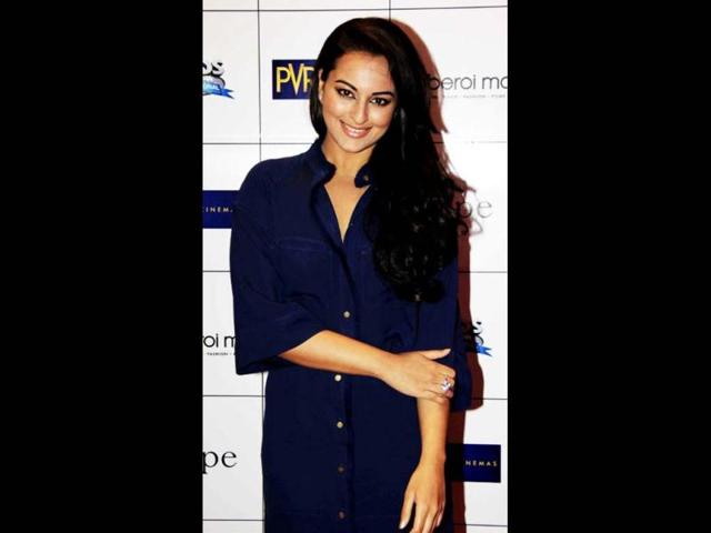 Sonakshi Sinha poses in style at the event.