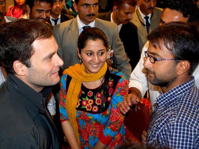 Congress leader Rahul Gandhi interacts with students during a visit to Kashmir University in Srinagar. PTI Photo
