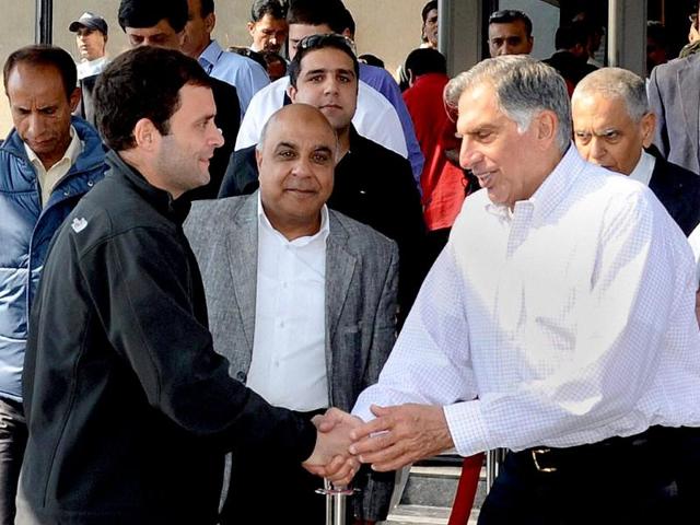 Congress leader Rahul Gandhi and industrialist Ratan Tata shake hands at a business luncheon meeting in Srinagar. PTI Photo