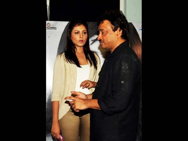 Bollywood actress Madhushalini and RGV at the promotion of Bhoot Returns. (AFP)
