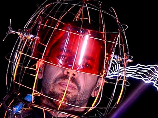 US magician David Blaine stands under lighting bolts at the start of his latest performance, "Electrified", in New York. AFP /Emmanuel Dunand