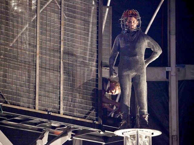 Magician David Blaine is helped into position prior to a stunt involving channeling bolts of electricity from various tesla coils charged with one million volts of electricity on Pier 54 in New York. Reuters/Andrew Burton