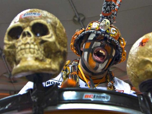 A BC Lions supporter cheers for the team during the first half of their CFL football game against the Calgary Stampeders in Vancouver, British Columbia. Reuters/Andy Clark
