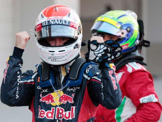 Red Bull driver Sebastian Vettel of Germany celebrates after winning the Japanese Formula One Grand Prix at the Suzuka Circuit in Suzuka, Japan. (AP Photo/Shizuo Kambayashi) 