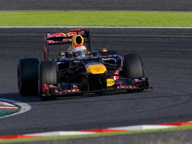 Red Bull Formula One driver Sebastian Vettel of Germany drives during the Japanese F1 Grand Prix at the Suzuka circuit. (Reuters/Kim Kyung-Hoon) 