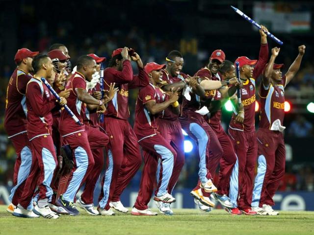 West Indies' team members celebrate winning the ICC Twenty20 Cricket World Cup final match defeating Sri Lanka in Colombo. (AP Photo/Eranga Jayawardena)