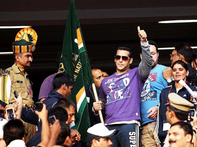 Bollywood actor Salman Khan flags off a ITBP half marathon at Jawharlal Nehru Stadium in New Delhi on Sunday. (PTI)