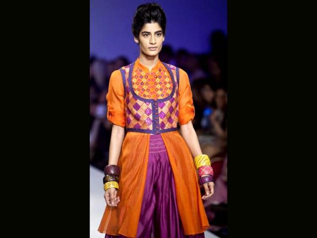 A model displays a creation by Payal Pratap during the Wills Lifestyle India Fashion Week in New Delhi, India, Saturday, Oct. 6, 2012. (AP Photo/Tsering Topgyal)