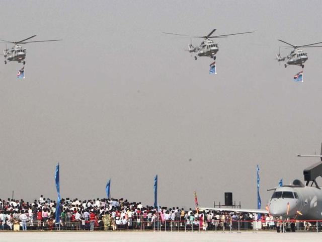 IAF helicopters present an air show during the Air Force Day celebrations in Hindon. PTI Photo