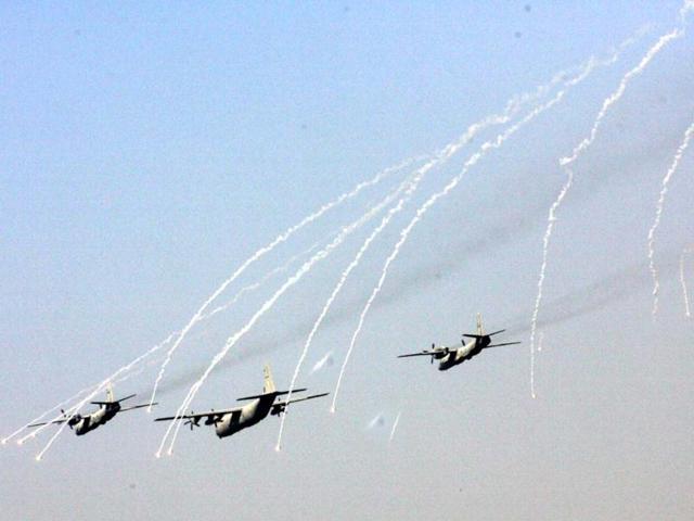 Transport aircrafts of the IAF relasing flares while participating in a airshow during the anniversary of the IAF at Hindon. UNI Photo