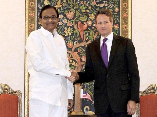Finance minister Palaniappan Chidambaram (L) shakes hands with US Treasury Secretary Timothy Geithner before their meeting in New Delhi. Geithner is on a two-day visit to India. REUTERS/B Mathur