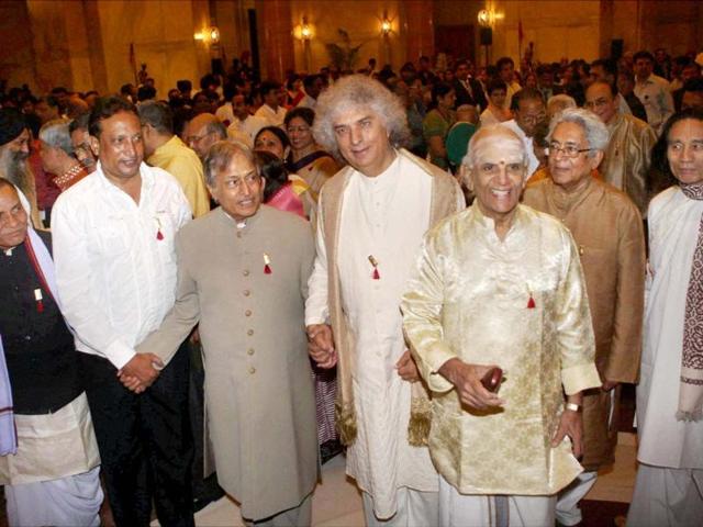 Recipients-of-Sangeet-Natak-Akademi-fellowship-Sarod-maestro-Amjad-Ali-Khan-Santoor-exponent-Pandit-Shiv-Kumar-Sharma-and-Mridangam-player-Umayalpuram-Kasiviswanatha-Sivaraman-during-the-Sangeet-Natak-Akademi-Awards-2011-function-at-Rashtrapati-Bhavan-in-New-Delhi-PTI-Photo-by-Subhav-Shukla