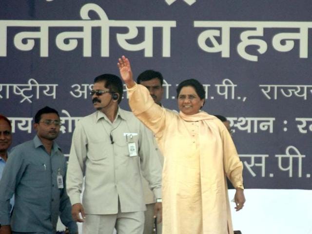 Bahujan Samaj Party supremo Mayawati waves to supporters during a rally commemorating the sixth death anniversary of party founder Kanshiram in Lucknow. AFP