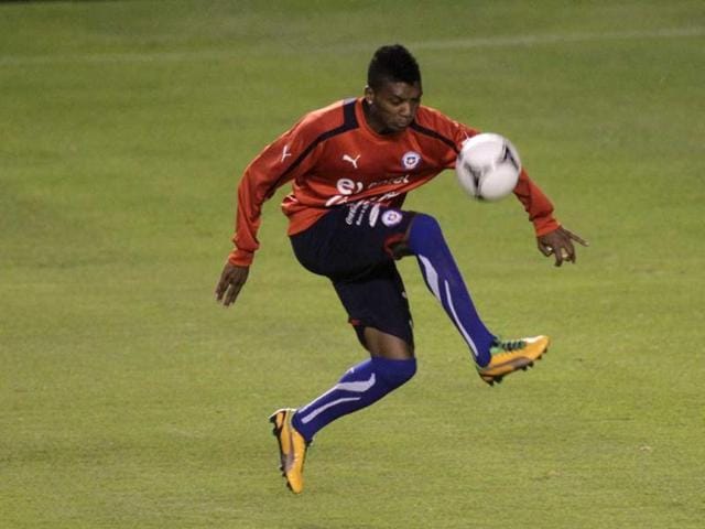Chile's player Junior Fernandes trains during a practice session in Quito, Ecuador. AP Photo/Dolores Ochoa