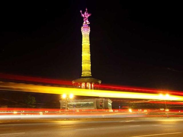 The Siegessaeule (victory column) is illuminated during a technical check for the Festival of Lights in Berlin. Reuters/Fabrizio Bensch