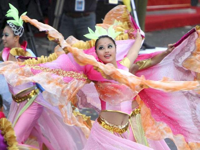 Taiwanese students perform during National Day celebrations marking the 101st anniversary of the founding of the Republic of China, in front of the Presidential Office in Taipei, Taiwan. AP Photo/Chiang Ying-ying