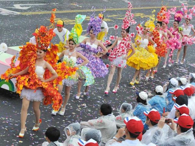Students perform during celebrations to mark the centenary of the revolution that set the stage for the Republic of China, island's official name, in front of Taiwan's Presidential Office in Taipei. AFP Photo/Mandy Cheng