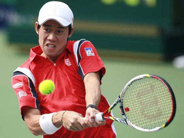 Kei Nishikori of Japan returns the ball to Sam Querrey of the US during their men's singles match in the Shanghai Masters tennis tournament in Shanghai. Reuters/Aly Song