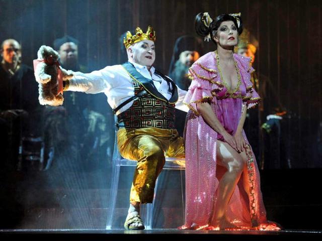Cheryl Barker (R), performs with 'Herod' played by John Pickering (C), in the 'Dance of the Seven Veils' during a full dress rehearsal for the Opera Australia production of 'Salome' at the Sydney Opera House. AFP PHOTO/ Greg WOOD