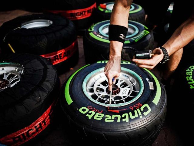 A mechanic checks tyres in the paddock of the circuit for the Formula One Korean Grand Prix in Yeongam. AFP photo