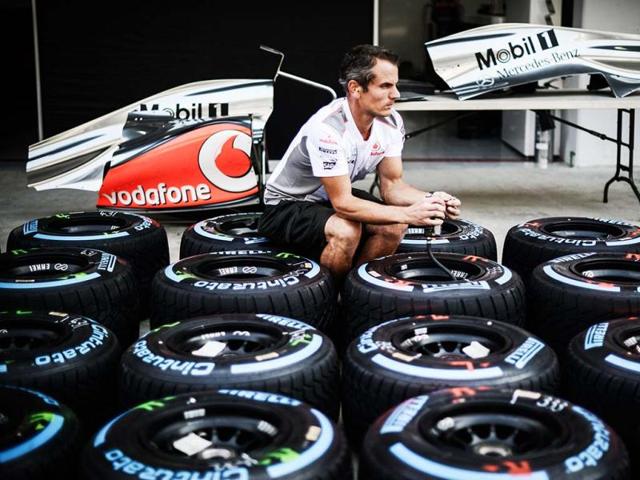 A McLaren Mercedes team member checks tyres in the pit lane of the circuit ahead of the Formula One Korean Grand Prix in Yeongam. AFP photo