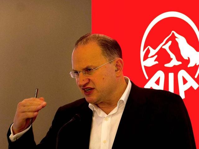 AIA group chief executive and president Mark Tucker addresses a press conference at the company's headquarters in Hong Kong. Asian insurance giant AIA said it will buy ING's Malaysian insurance unit for $ 1.73 billion, the Dutch banking firm's first step in selling off its assets in the region. AFP photo