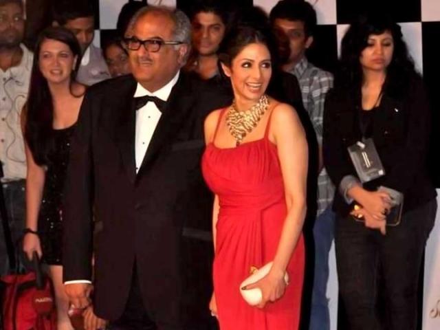 Sridevi with husband Boney Kapoor poses at the red carpet.