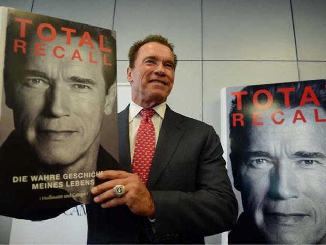 Arnold-Schwarzenegger-with-his-book-Total-Recall-at-the-64th-Frankfurt-Book-Fair-on-October-10-2012-Photo-AFP-Johannes-Eisele