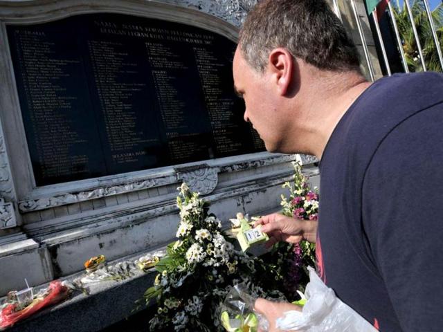 Laczynski, a relative of victims, laying an angel doll at the 2002 Bali Bombing memorial in the Kuta tourist area near Denpasar, on Indonesia's resort island of Bali. AFP Photo
