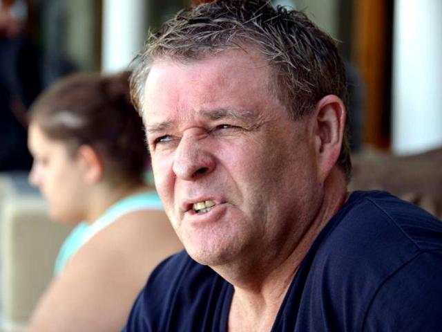 Peter Hughes, a 2002 Bali bomb survivor, telling his story in the Petitenget tourist area, near Denpasar, on Indonesia's resort island of Bali. AFP Photo