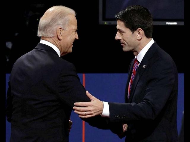 Vice President Joe Biden and Republican vice presidential nominee Paul Ryan of Wisconsin shake hands after the vice presidential debate at Centre College in Danville. AP photo
