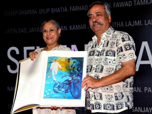 Jaya Bachchan flaunts one of the art works during the event.